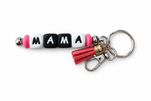 MAMA keychain on a white background